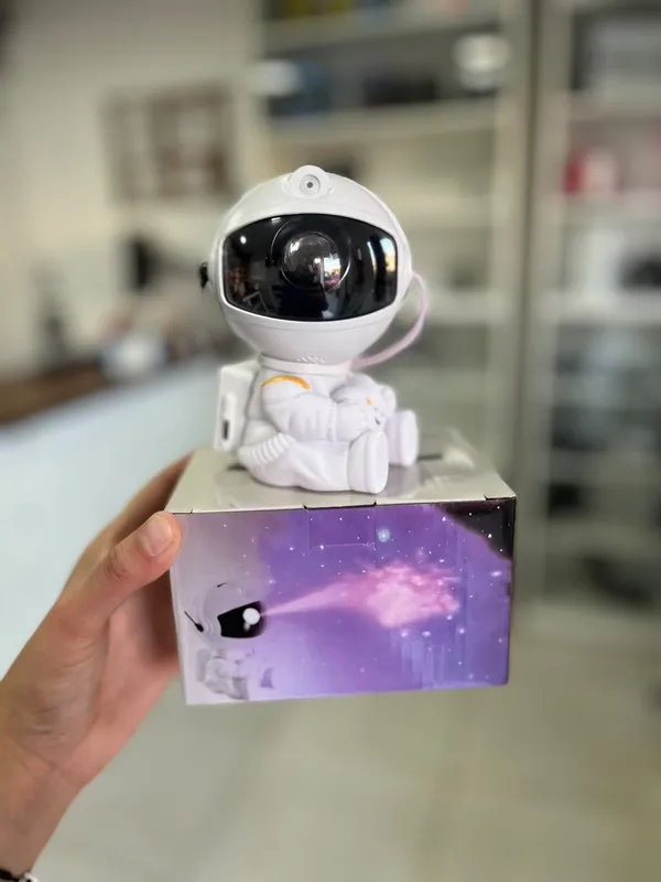 Astronauta proyector de galaxia - FoxCel