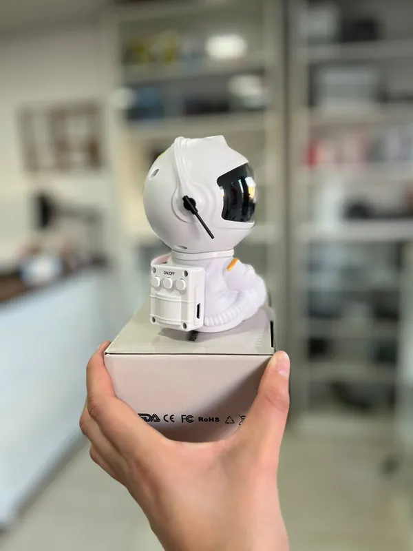 Astronauta proyector de galaxia - FoxCel