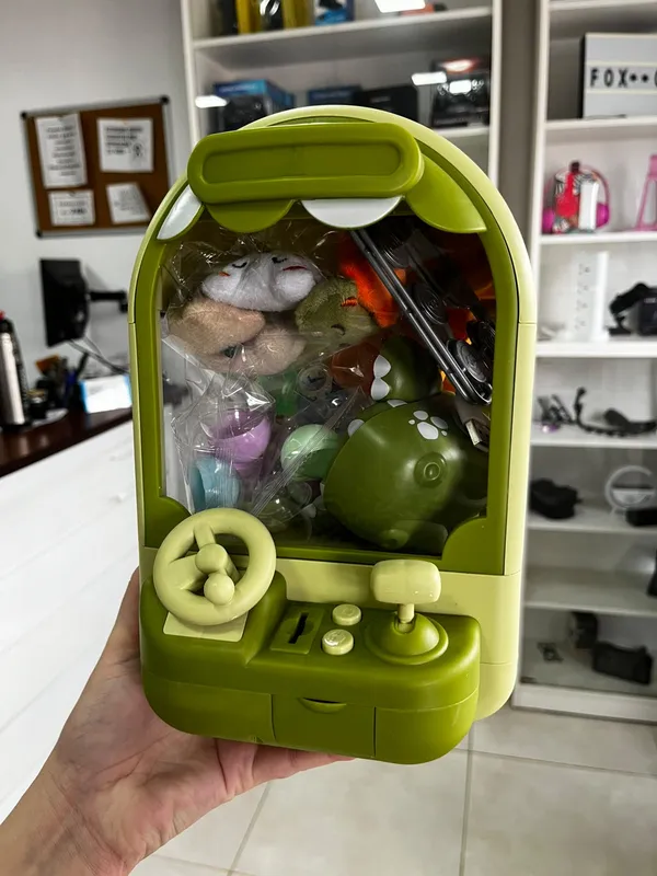 Maquina saca peluches Dinosaurio - FoxCel